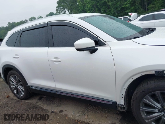 2021 Mazda CX-9 Signature with VIN JM3TCBEY4M0517118, listed as a IAAI auction lot 42400675 with 56,260 mi miles and . Bid and sale history available at DreamBid. Image 14.