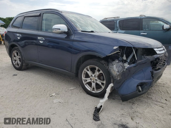 2015 Mitsubishi Outlander SE with VIN JA4AZ3A39FZ005622, listed as a Copart auction lot 55996605 with 121,285 mi miles and Salvage title. Bid and sale history available at DreamBid. Image 4.
