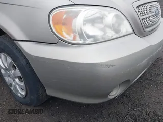 2004 Kia Sedona LX with VIN KNDUP131746563430, listed as a IAAI auction lot 41896386 with 141,526 mi miles. Bid and sale history available at carsss.com. Image 16.