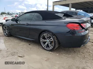 2016 BMW M6 z VIN WBS6G9C58GD931908, wystawiony jako Copart lot #72067214 z przebiegiem 84 170 mil mil oraz Szkody całkowita. Historia ofert i sprzedaży dostępna na DreamBid. Obrazek 2.