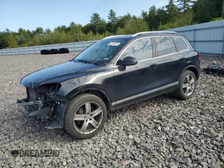 2014 Volkswagen Touareg Lux z VIN WVGEF9BP9ED005731, wystawiony jako Copart lot #66839284 z przebiegiem 148 649 mil mil oraz Szkody całkowita. Historia ofert i sprzedaży dostępna na DreamBid. Obrazek 1.