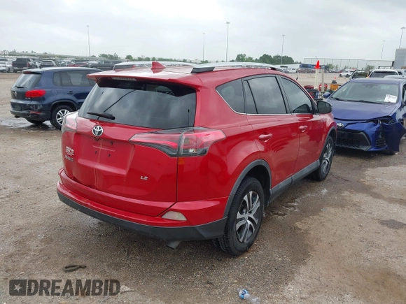 2016 Toyota RAV4 LE with VIN 2T3ZFREV4GW252399, listed as a IAAI auction lot 41955913 with 159,830 mi miles and . Bid and sale history available at carsss.com. Image 4.