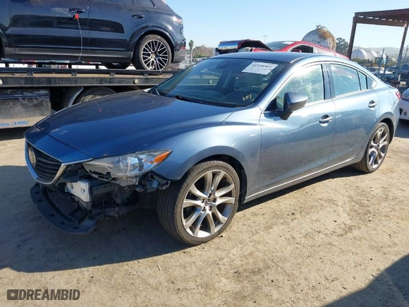 2014 Mazda Mazda6 i Grand Touring with VIN JM1GJ1W54E1103914, listed as a IAAI auction lot 41348965 with NaN miles. Bid and sale history available at carsss.com. Image 2.