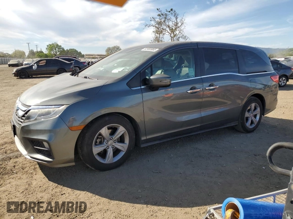 2018 Honda Odyssey EX-L with VIN 5FNRL6H76JB010103, listed as a Copart auction lot 52965965 with 129,837 mi miles and Salvage Title. Bid and sale history available at carsss.com. Image 1.
