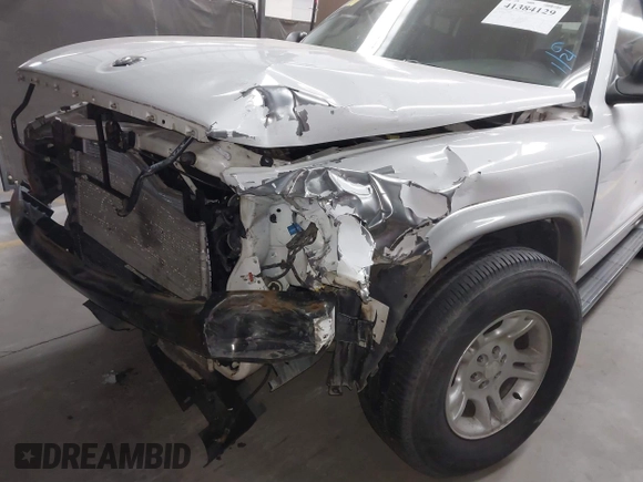 2002 Dodge Durango z VIN 1B4HR58N62F100400, wystawiony jako IAAI lot #41384129 z przebiegiem 125 338 mil mil oraz . Historia ofert i sprzedaży dostępna na DreamBid. Obrazek 6.