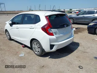 2015 Honda Fit LX with VIN 3HGGK5G57FM748159, listed as a IAAI auction lot 42344168 with 176,716 mi miles and . Bid and sale history available at DreamBid. Image 3.