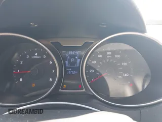 2012 Hyundai Veloster w/Black Int with VIN KMHTC6AD0CU056828, listed as a IAAI auction lot 42611623 with 136,242 mi miles and . Bid and sale history available at DreamBid. Image 7.
