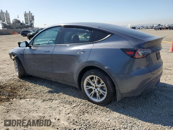 2023 Tesla Model Y Long Range with VIN 7SAYGDEE2PA164405, listed as a Copart auction lot 50085905 with 42,156 mi miles and Salvage Title. Bid and sale history available at DreamBid. Image 2.