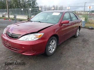 2004 Toyota Camry LE with VIN 4T1BF32K74U069737, listed as a IAAI auction lot 41746236 with 48,026 mi miles. Bid and sale history available at carsss.com. Image 2.