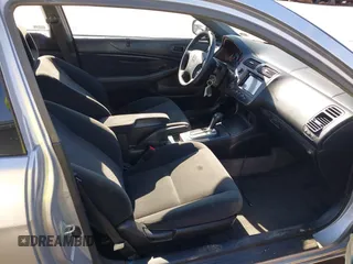 2004 Honda Civic LX with VIN 1HGEM22524L022246, listed as a IAAI auction lot 41589224 with 149,188 mi miles. Bid and sale history available at carsss.com. Image 5.