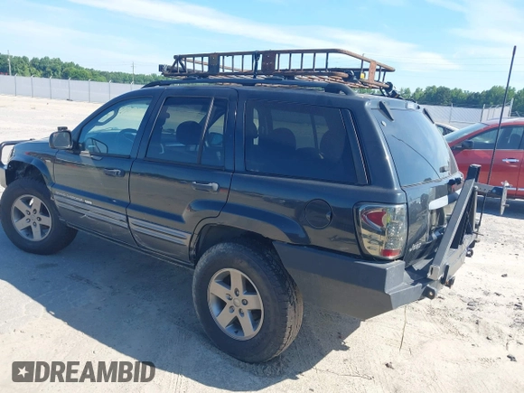 2004 Jeep Grand Cherokee Laredo z VIN 1J4GX48S04C281660, wystawiony jako IAAI lot #42551161 z przebiegiem 173 209 mil mil oraz . Historia ofert i sprzedaży dostępna na DreamBid. Obrazek 3.