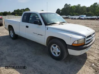2001 Dodge Dakota z VIN 1B7GL22X21S128774, wystawiony jako Copart lot #58313685 z przebiegiem 167 355 mil mil oraz Czysty tytuł • Clean title. Historia ofert i sprzedaży dostępna na DreamBid. Obrazek 4.