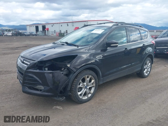 2013 Ford Escape SEL with VIN 1FMCU9H99DUA94169, listed as a IAAI auction lot 41937675 with 106,405 mi miles. Bid and sale history available at carsss.com. Image 2.