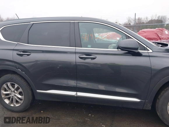 2020 Hyundai Santa Fe SE with VIN 5NMS2CAD8LH258275, listed as a IAAI auction lot 41912687 with 80,467 mi miles and . Bid and sale history available at DreamBid. Image 14.