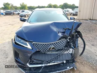 2022 Lexus RX 350 with VIN 2T2HZMAA5NC232352, listed as a IAAI auction lot 42399381 with 13,359 mi miles and . Bid and sale history available at DreamBid. Image 12.