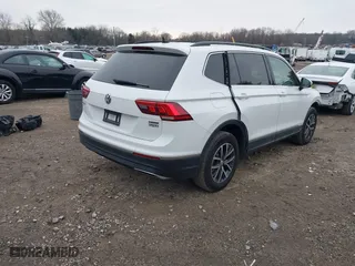 2020 Volkswagen Tiguan SE with VIN 3VV2B7AX0LM075033, listed as a IAAI auction lot 41310056 with 82,548 mi miles. Bid and sale history available at carsss.com. Image 4.
