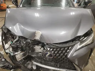 2021 Lexus UX with VIN JTHX9JBH8M2047296, listed as a Copart auction lot 87916535 with 10,297 mi miles and Salvage Title. Bid and sale history available at carsss.com. Image 13.