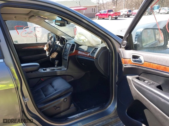 2012 Jeep Grand Cherokee Limited with VIN 1C4RJFBG9CC272826, listed as a IAAI auction lot 41833337 with 108,295 mi miles. Bid and sale history available at carsss.com. Image 5.