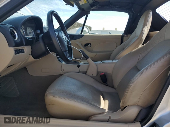2003 Mazda MX-5 Miata Cloth z VIN JM1NB353430301685, wystawiony jako Copart lot #48756715 z przebiegiem 57 414 mil mil oraz Szkoda całkowita • Salvage title. Historia ofert i sprzedaży dostępna na DreamBid. Obrazek 7.