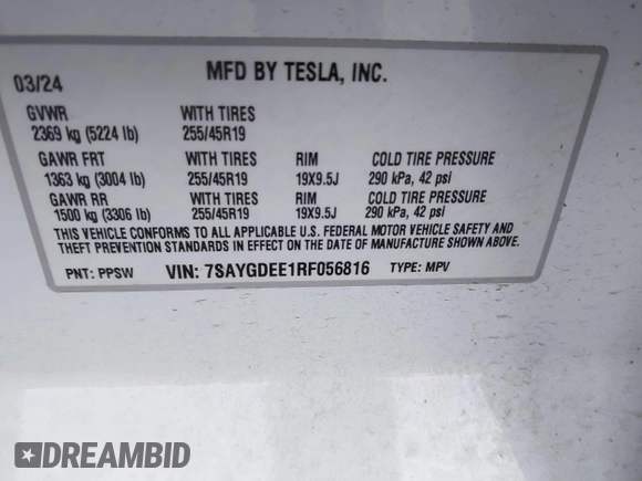 2024 Tesla Model Y Long Range with VIN 7SAYGDEE1RF056816, listed as a IAAI auction lot 41809125 with 6,434 mi miles and . Bid and sale history available at DreamBid. Image 9.