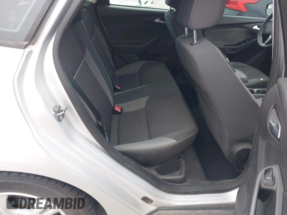 2013 Ford Focus SE z VIN 1FADP3F25DL189133, wystawiony jako IAAI lot #42438118 z przebiegiem 122 350 mil mil oraz . Historia ofert i sprzedaży dostępna na DreamBid. Obrazek 8.