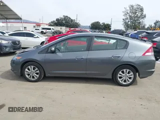 2012 Honda Insight EX z VIN JHMZE2H73CS000751, wystawiony jako IAAI lot #41687288 z przebiegiem 181 593 mil mil oraz . Historia ofert i sprzedaży dostępna na DreamBid. Obrazek 14.