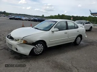 2000 Nissan Sentra XE with VIN 3N1CB51DXYL353143, listed as a Copart auction lot 55061205 with 145,737 mi miles and Salvage title. Bid and sale history available at DreamBid. Image 1.