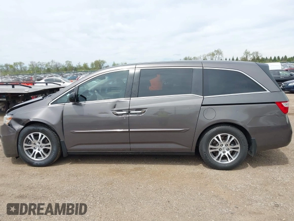 2011 Honda Odyssey EX-L with VIN 5FNRL5H68BB100274, listed as a IAAI auction lot 42159787 with 205,616 mi miles and . Bid and sale history available at carsss.com. Image 14.