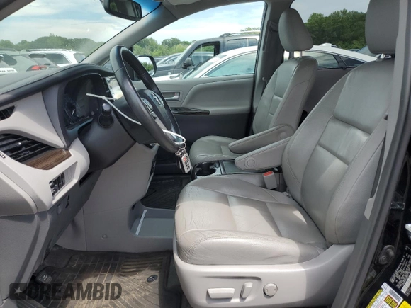 2017 Toyota Sienna XLE with VIN 5TDDZ3DC0HS150633, listed as a Copart auction lot 62642575 with 94,439 mi miles and Salvage title. Bid and sale history available at DreamBid. Image 7.