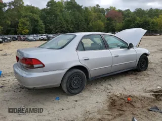 2001 Honda Accord LX with VIN 1HGCG16401A073312, listed as a Copart auction lot 71996444 with 232,315 mi miles and Salvage title. Bid and sale history available at DreamBid. Image 3.