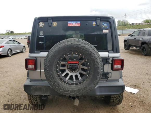 2018 Jeep Wrangler Unlimited Sport S с VIN 1C4HJXDG7JW138049, выставлен на аукционе Copart как лот 57168065 с пробегом 53 267 миль миль и Списание • Salvage title. История ставок и продаж доступна на DreamBid. Изображение 6.