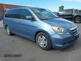 2007 Honda Odyssey EX-L z VIN 5FNRL38757B121989, wystawiony jako IAAI lot #42323131 z przebiegiem 174 906 mil mil oraz . Historia ofert i sprzedaży dostępna na DreamBid. Obrazek 1.