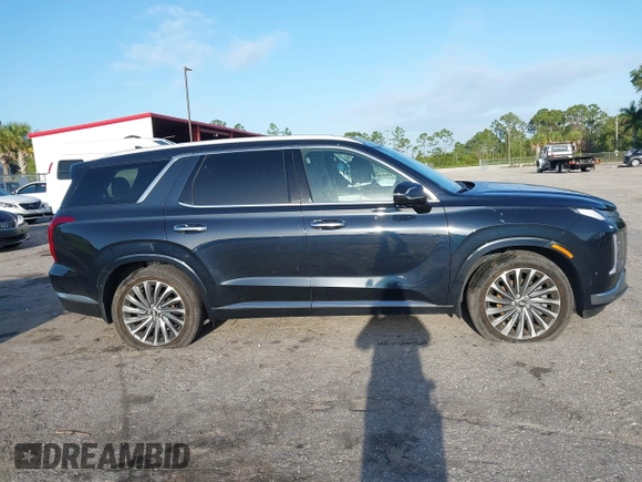 2024 Hyundai Palisade Calligraphy z VIN KM8R74GE2RU677273, wystawiony jako IAAI lot #41989335 z przebiegiem 9 200 mil mil oraz . Historia ofert i sprzedaży dostępna na DreamBid. Obrazek 13.
