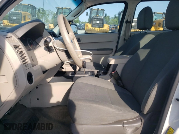 2010 Ford Escape XLS with VIN 1FMCU0C76AKB82752, listed as a Copart auction lot 57626565 with 194,931 mi miles and Salvage title. Bid and sale history available at DreamBid. Image 7.