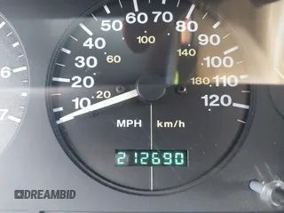 1996 Jeep Grand Cherokee Limited z VIN 1J4GZ78Y3TC191000, wystawiony jako IAAI lot #42259621 z przebiegiem 212 690 mil mil oraz . Historia ofert i sprzedaży dostępna na DreamBid. Obrazek 15.