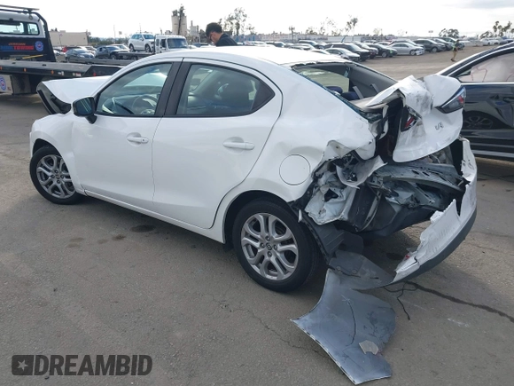 2016 Scion iA z VIN 3MYDLBZV9GY139080, wystawiony jako IAAI lot #41494384 z przebiegiem 106 092 mil mil oraz . Historia ofert i sprzedaży dostępna na DreamBid. Obrazek 3.