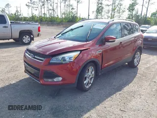 2014 Ford Escape Titanium with VIN 1FMCU0JX7EUB96463, listed as a IAAI auction lot 41935190 with 67,098 mi miles. Bid and sale history available at carsss.com. Image 2.