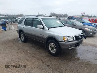 2001 Honda Passport LX z VIN 4S6CK58W714414399, wystawiony jako IAAI lot #41641270 z przebiegiem 203 093 mil mil oraz . Historia ofert i sprzedaży dostępna na DreamBid. Obrazek 1.