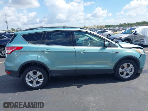 2013 Ford Escape SE with VIN 1FMCU9GX0DUC75662, listed as a IAAI auction lot 42549360 with 156,666 mi miles and . Bid and sale history available at DreamBid. Image 13.