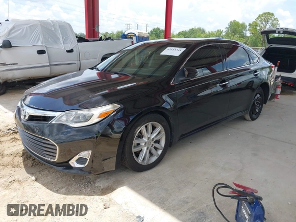 2013 Toyota Avalon XLE with VIN 4T1BK1EB6DU056103, listed as a IAAI auction lot 42553318 with 114,143 mi miles and . Bid and sale history available at DreamBid. Image 2.