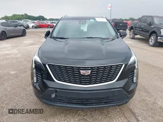 2020 Cadillac XT4 FWD Luxury z VIN 1GYAZAR4XLF146598, wystawiony jako IAAI lot #42211317 z przebiegiem 37 313 mil mil oraz . Historia ofert i sprzedaży dostępna na DreamBid. Obrazek 12.