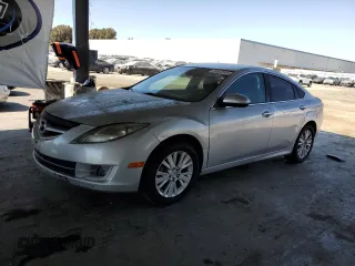 2009 Mazda 6 i Grand Touring with VIN 1YVHP82A495M36508, listed as a Copart auction lot 64552505 with 174,216 mi miles and Salvage title. Bid and sale history available at DreamBid. Image 1.