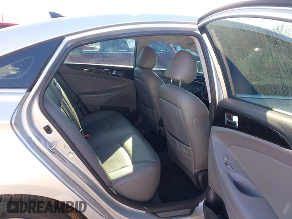 2013 Hyundai Sonata Limited with VIN 5NPEC4AB8DH805564, listed as a IAAI auction lot 41133553 with 99,410 mi miles and . Bid and sale history available at DreamBid. Image 8.