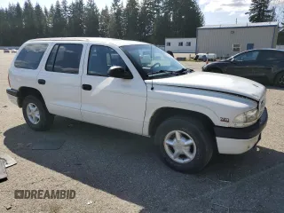 2000 Dodge Durango z VIN 1B4HR28Y3YF139835, wystawiony jako Copart lot #51969795 z przebiegiem 151 644 mil mil oraz Szkoda całkowita • Salvage title. Historia ofert i sprzedaży dostępna na DreamBid. Obrazek 4.