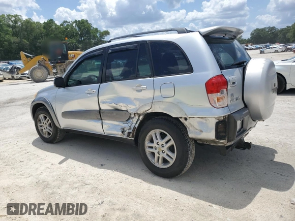 2001 Toyota RAV4 with VIN JTEGH20V510026430, listed as a Copart auction lot 55208815 with 235,190 mi miles and Salvage title. Bid and sale history available at DreamBid. Image 2.