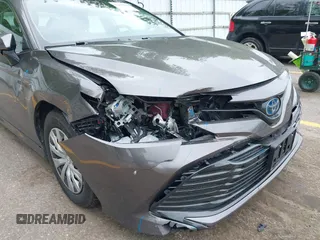 2019 Toyota Camry Hybrid LE z VIN 4T1B31HK4KU511360, wystawiony jako IAAI lot #42298260 z przebiegiem 133 019 mil mil oraz . Historia ofert i sprzedaży dostępna na DreamBid. Obrazek 6.