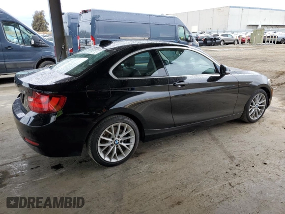 2014 BMW 2 Series 228i with VIN WBA1F5C53EV255420, listed as a Copart auction lot 48707395 with 65,135 mi miles and Salvage Title. Bid and sale history available at DreamBid. Image 3.