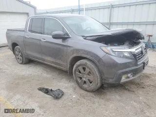 2020 Honda Ridgeline RTL-E with VIN 5FPYK3F73LB005001, listed as a Copart auction lot 86960494 with 39,714 mi miles and Salvage Title. Bid and sale history available at carsss.com. Image 4.