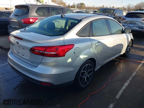 2017 Ford Focus SEL with VIN 1FADP3H21HL336597, listed as a IAAI auction lot 41729173 with 166,140 mi miles. Bid and sale history available at carsss.com. Image 4.