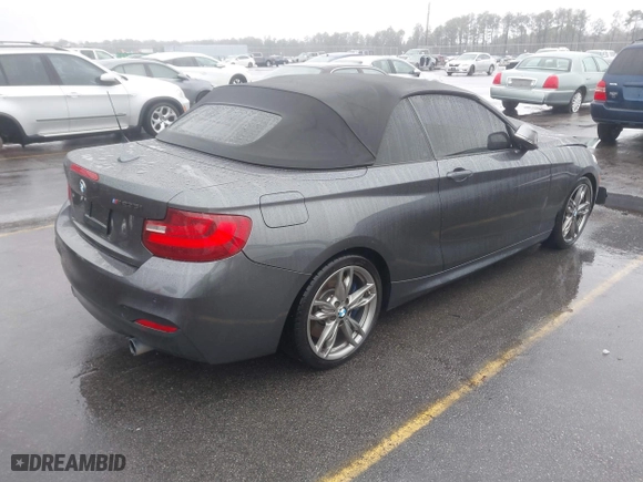 2015 BMW 2 Series M235i with VIN WBA1M1C50FV393092, listed as a IAAI auction lot 41507537 with 79,321 mi miles. Bid and sale history available at carsss.com. Image 4.